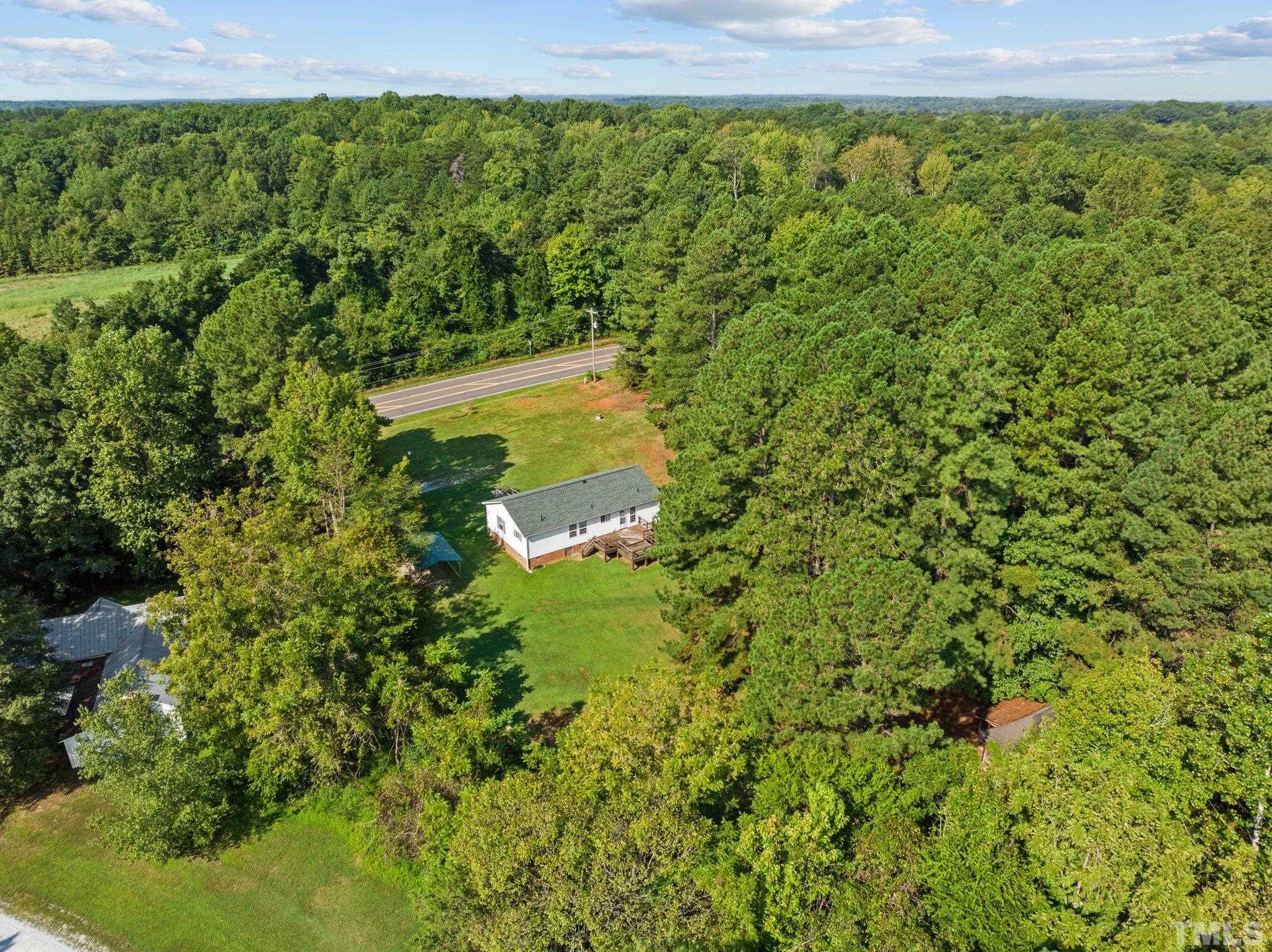 4505 Guess Road Rougemont, NC 27572 - Photo 29 of 33 a view of a bunch of trees and bushes