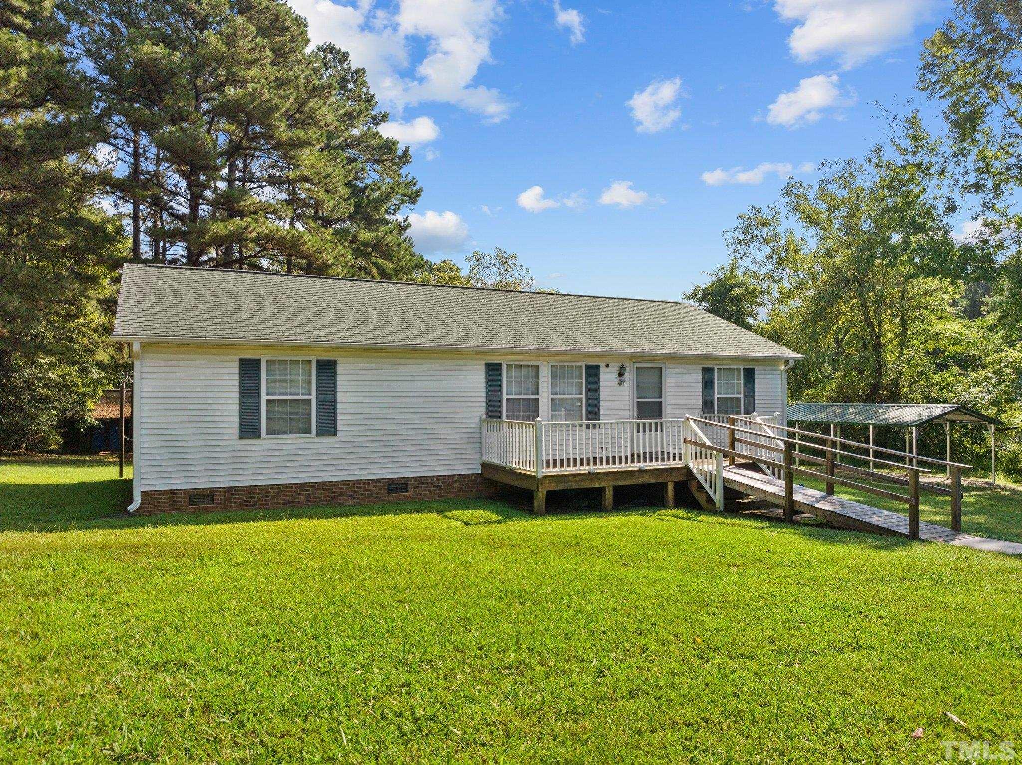 4505 Guess Road Rougemont, NC 27572 - Photo 30 of 33 a front view of a house with a yard