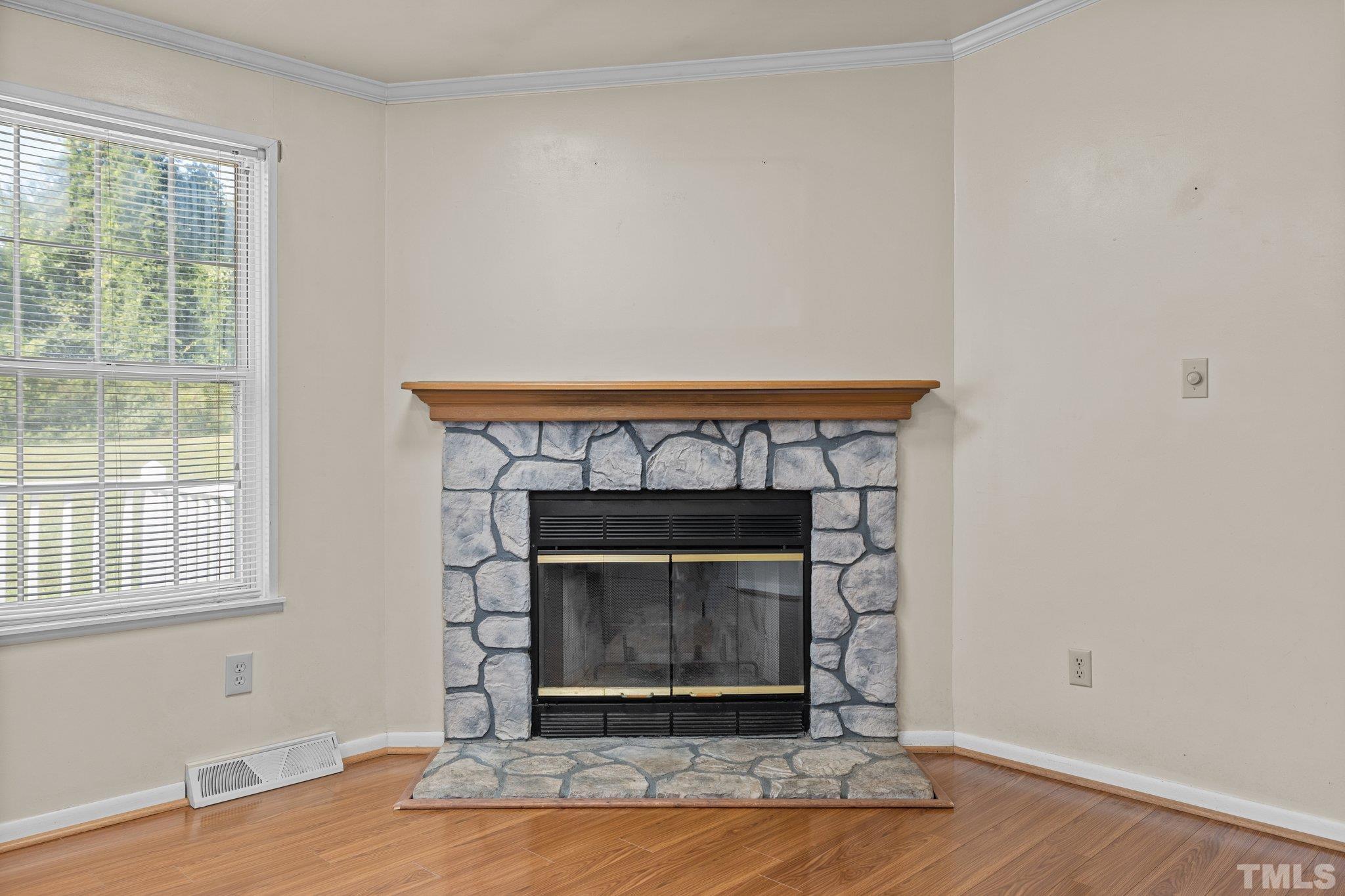 4505 Guess Road Rougemont, NC 27572 - Photo 6 of 33 a living room with a fireplace