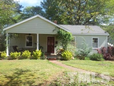 501 Mial Street Raleigh, NC 27608 - Photo 1 of 6 a front view of house with yard and green space
