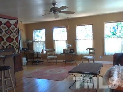 501 Mial Street Raleigh, NC 27608 - Photo 2 of 6 a living room with furniture and a window