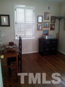 501 Mial Street Raleigh, NC 27608 - Photo 5 of 6 a room with a window and a table