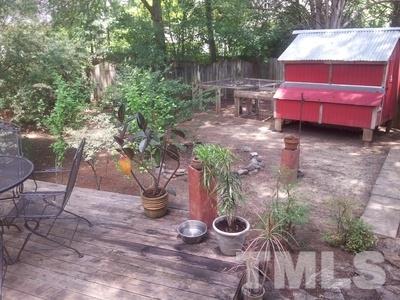501 Mial Street Raleigh, NC 27608 - Photo 6 of 6 a view of a fire pit with a chair