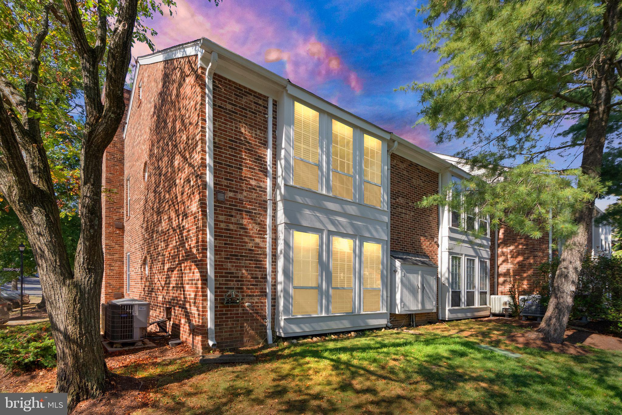 2592 South Arlington Mill Drive, Unit 7 Arlington, VA 22206 - Photo 4 of 44 a view of a house with a yard