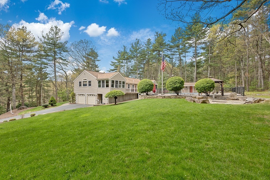 56 Leland Road Norfolk, MA 02056 - Photo 4 of 28 a view of an house with outdoor space and sitting area