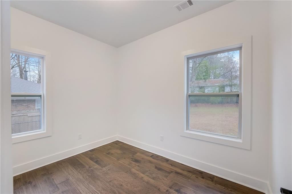 1718 Line Street Decatur, GA 30032 - Photo 1 of 1 a view of an empty room with a window