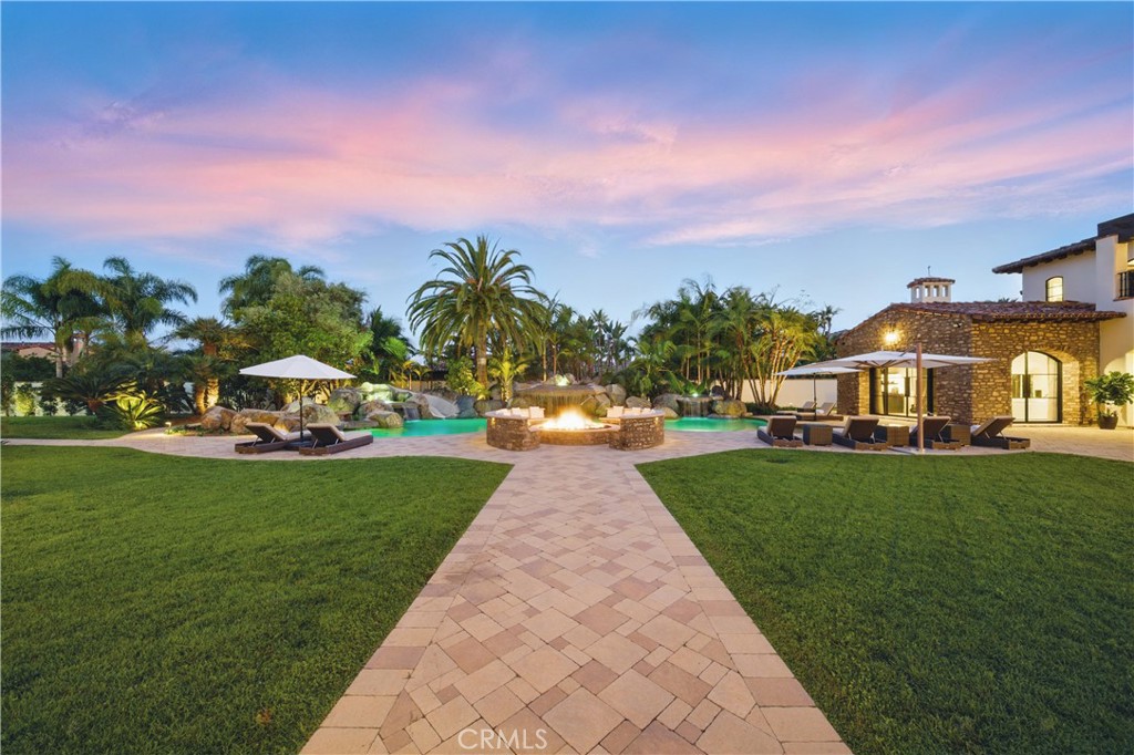 15931 Via De Santa Fe Rancho Santa Fe, CA 92067 - Photo 46 of 50 a front view of a house with garden