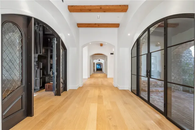 a view of a hallway view with staircase