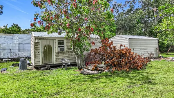 a view of a backyard with a garden