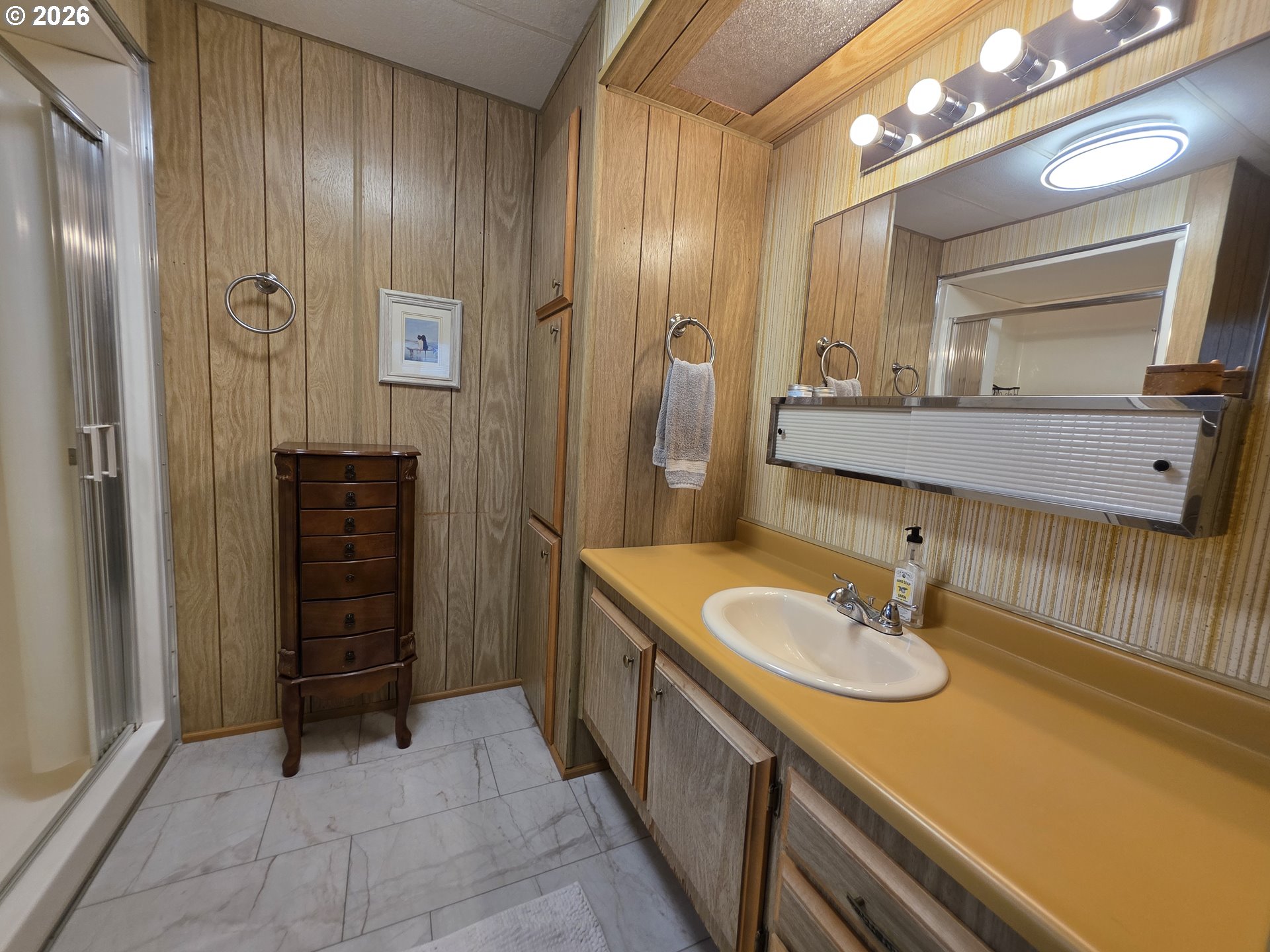 507 North 19th Avenue, Unit 49 Cornelius, OR 97113 - Photo 21 of 33 a bathroom with a sink and a mirror