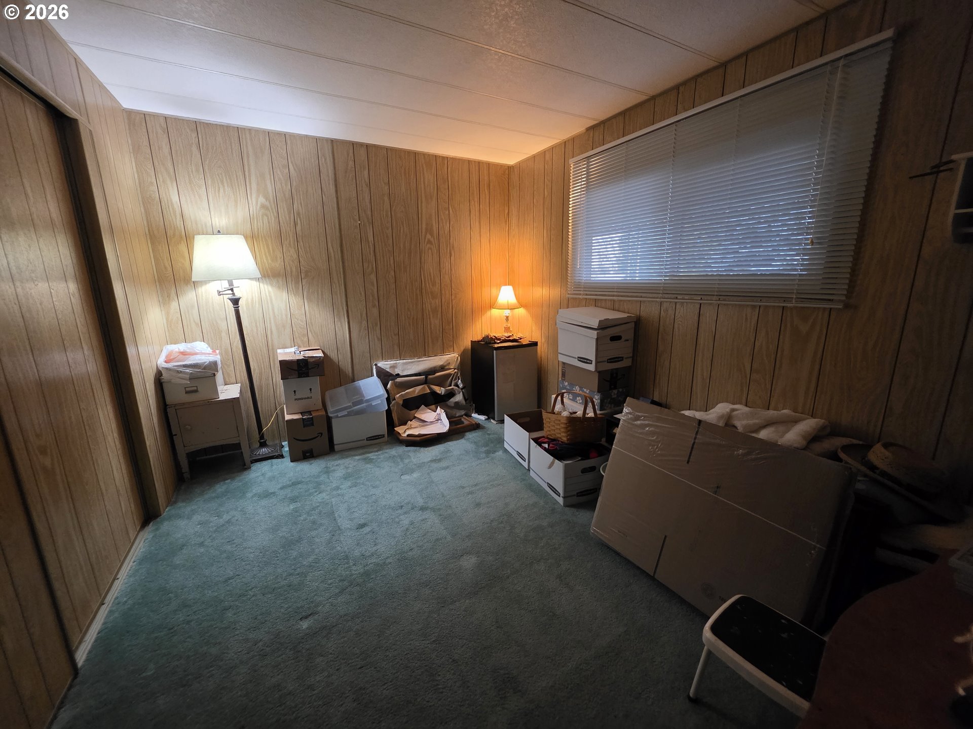507 North 19th Avenue, Unit 49 Cornelius, OR 97113 - Photo 25 of 33 a living room with furniture a flat screen tv and a window