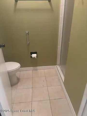 a bathroom with a sink and toilet
