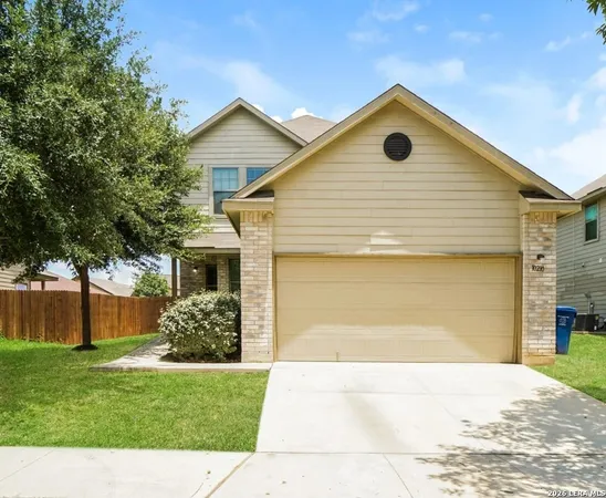 a front view of house with yard