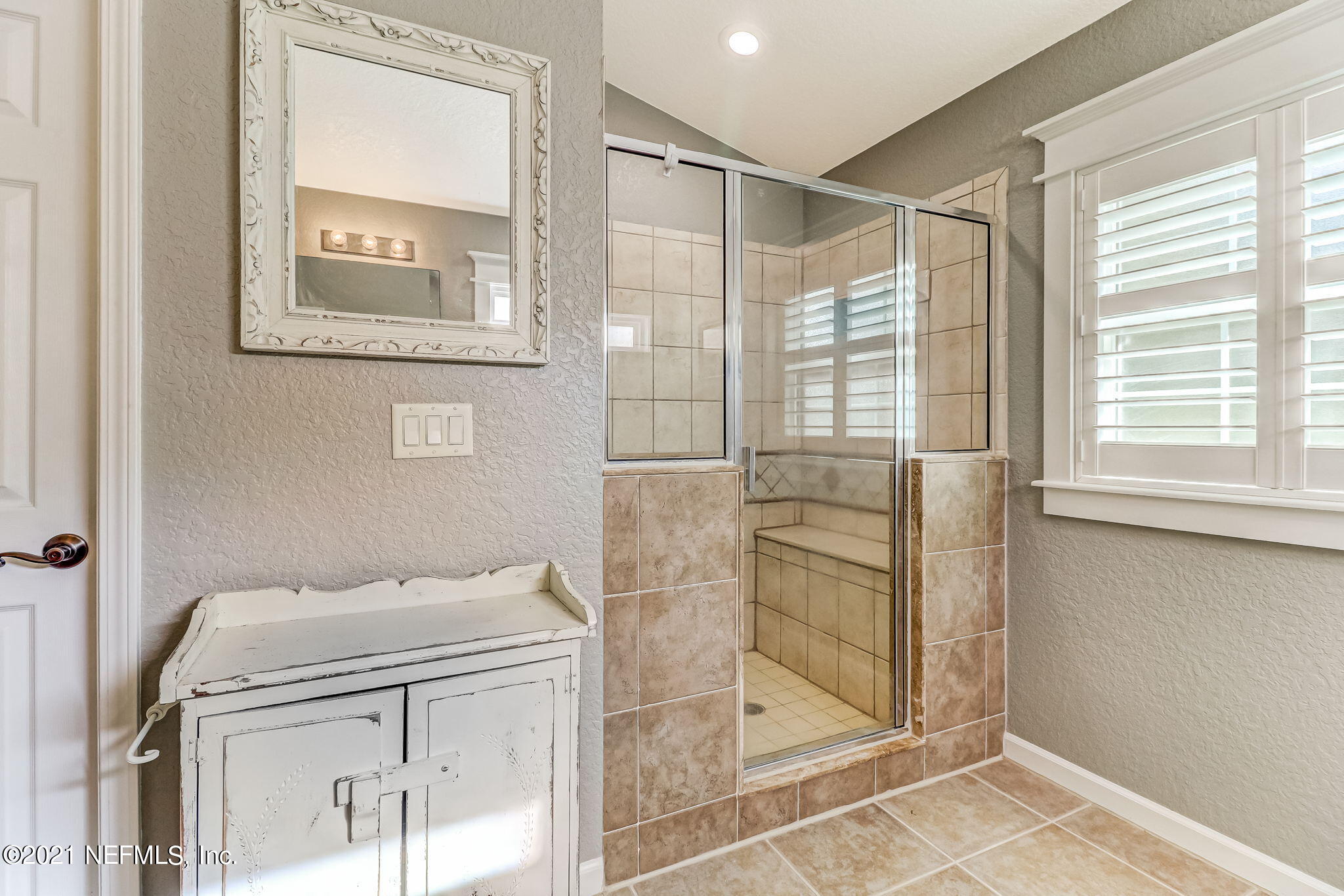 96931 Blackrock Road Yulee, FL 32097 - Photo 18 of 28 a bathroom with a shower and a sink