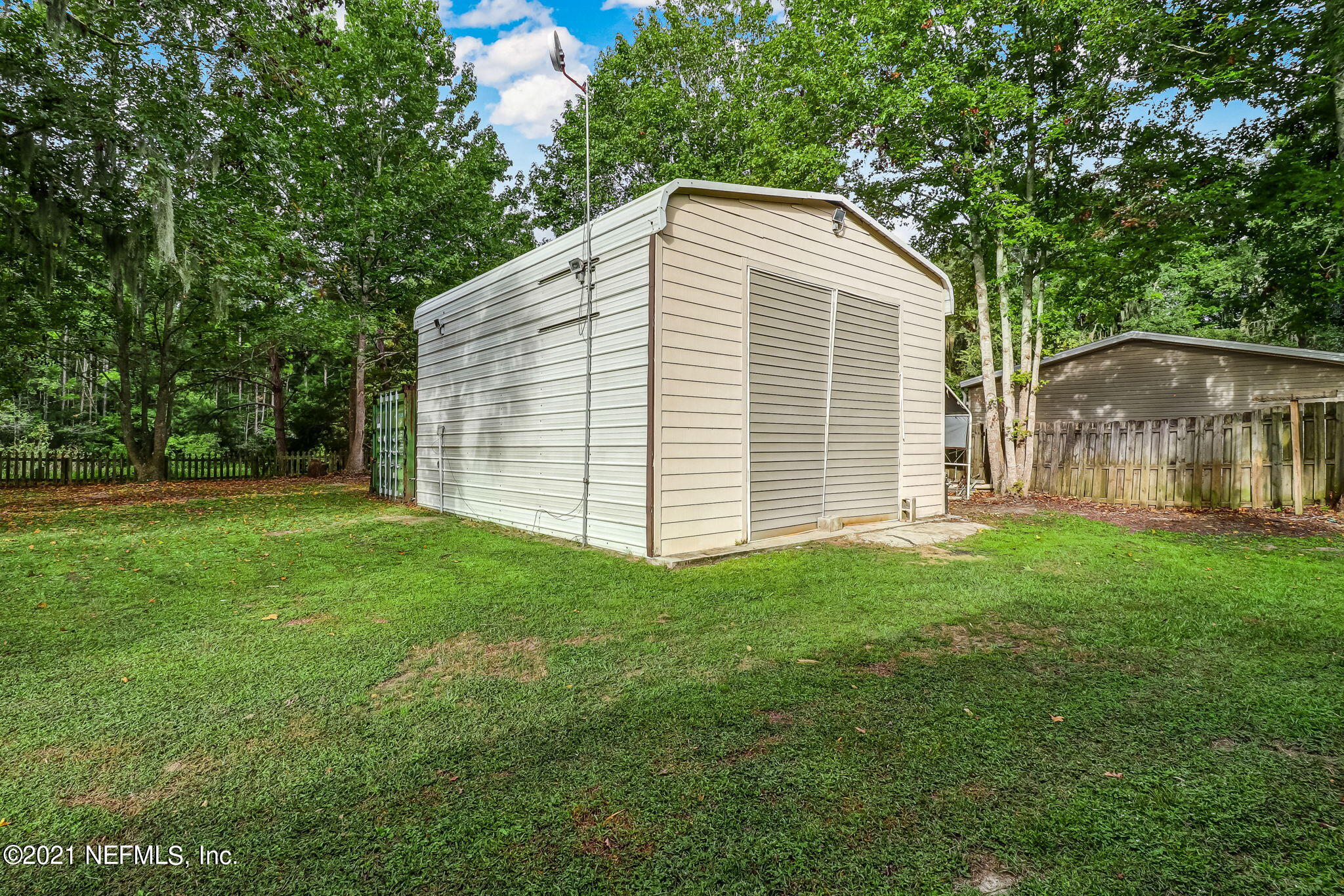96931 Blackrock Road Yulee, FL 32097 - Photo 25 of 28 a view of a house with backyard