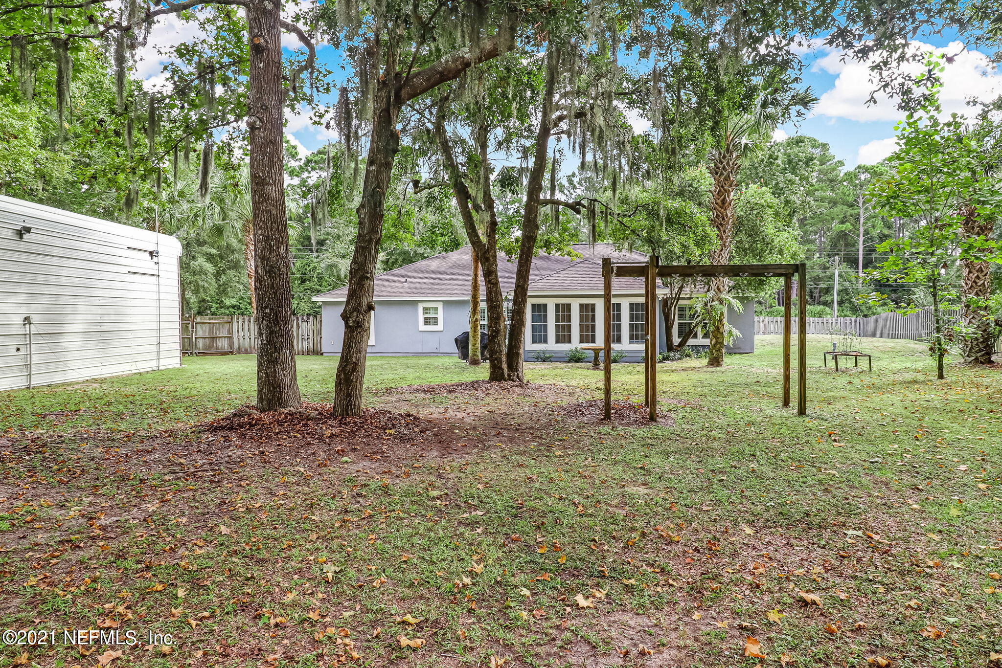 96931 Blackrock Road Yulee, FL 32097 - Photo 28 of 28 a view of outdoor space with trees