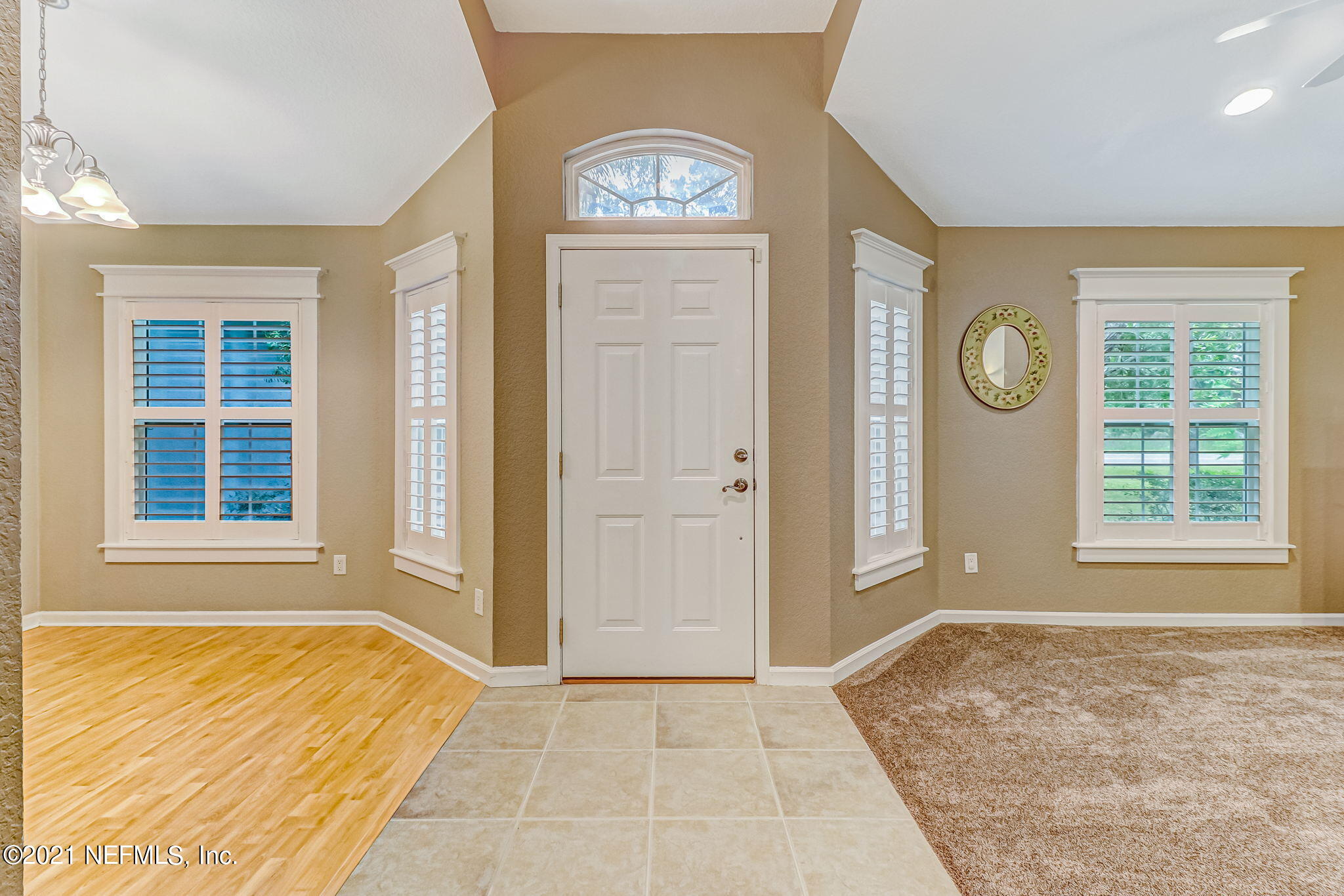 96931 Blackrock Road Yulee, FL 32097 - Photo 4 of 28 an empty room with window and mirror