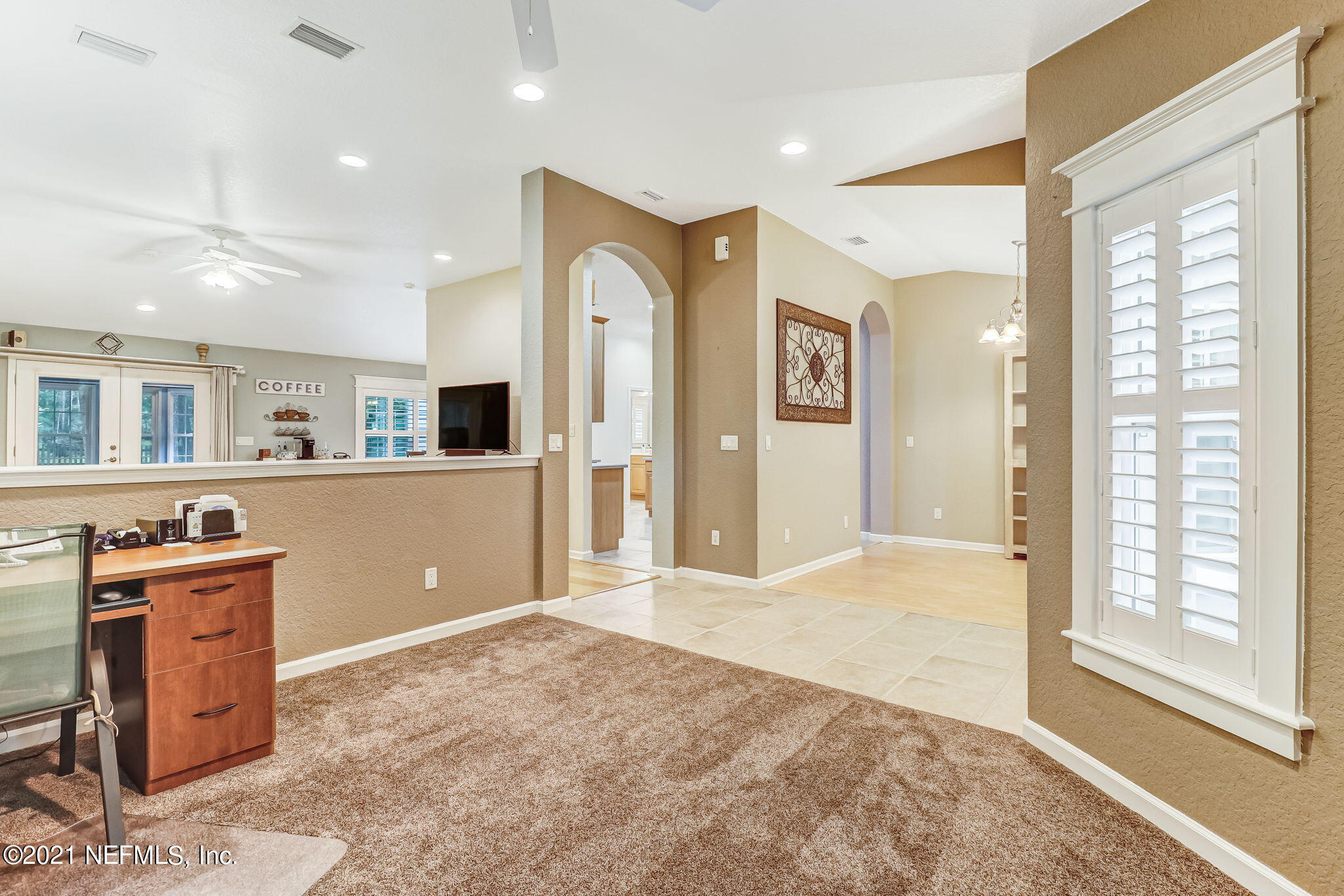 96931 Blackrock Road Yulee, FL 32097 - Photo 6 of 28 a view of a kitchen cabinets and wooden floor