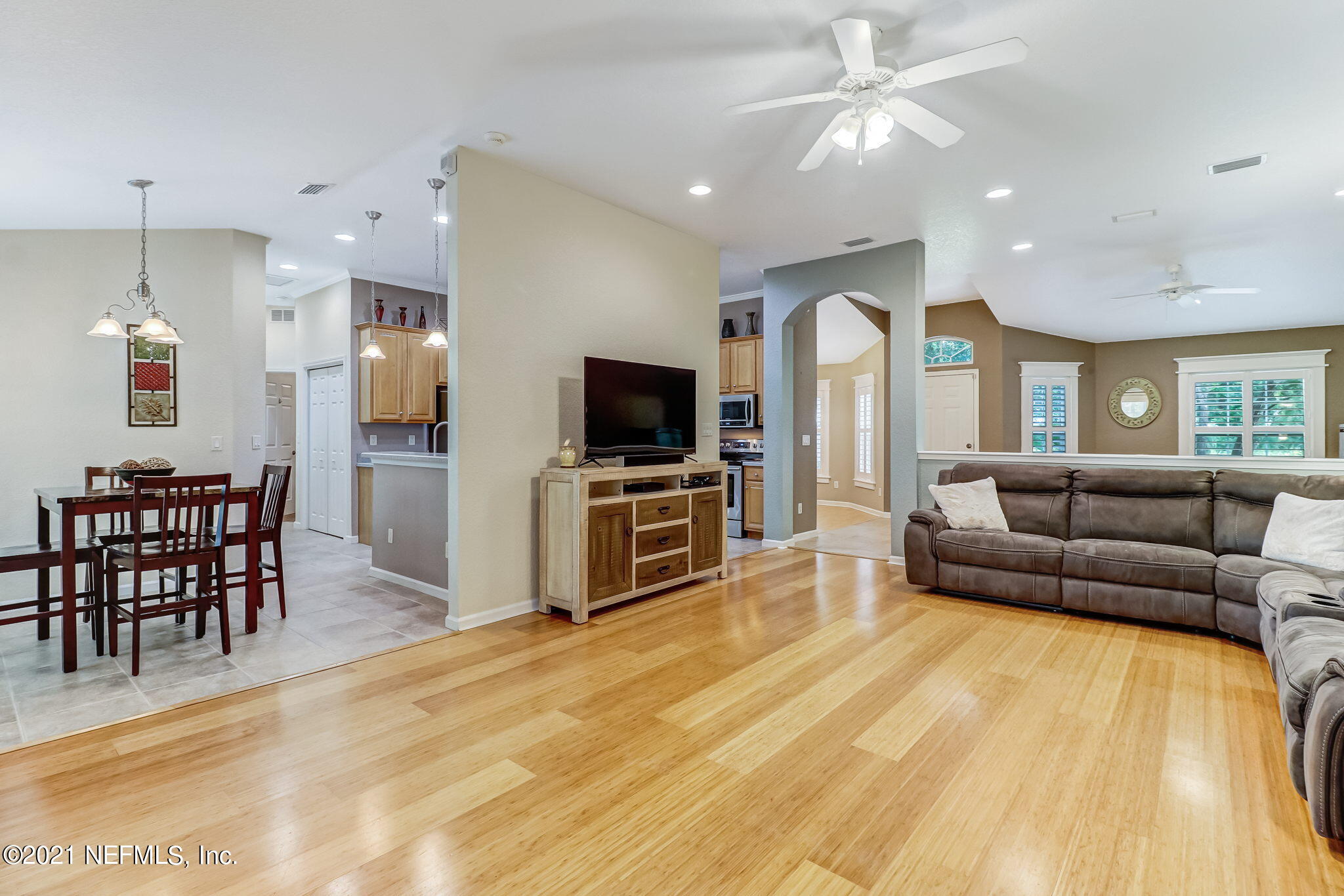 96931 Blackrock Road Yulee, FL 32097 - Photo 10 of 28 a living room with furniture and a flat screen tv