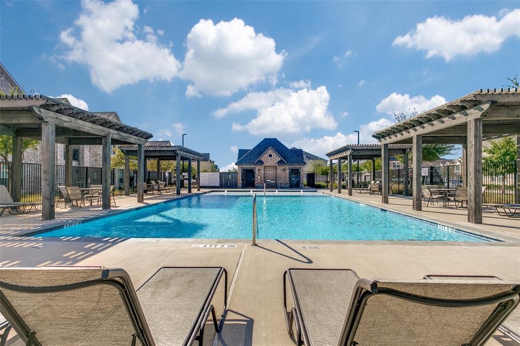 663 Vista Oaks Road Lewisville, TX 75067 - Photo 12 of 12 a view of a house with backyard and porch