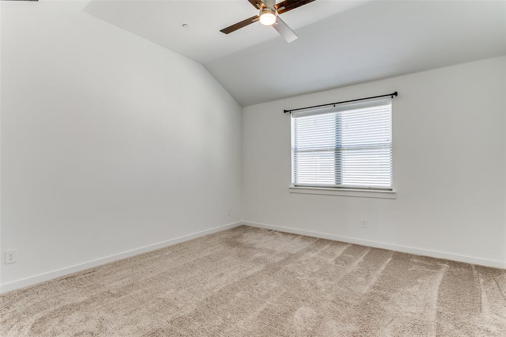 663 Vista Oaks Road Lewisville, TX 75067 - Photo 10 of 12 an empty room with a window