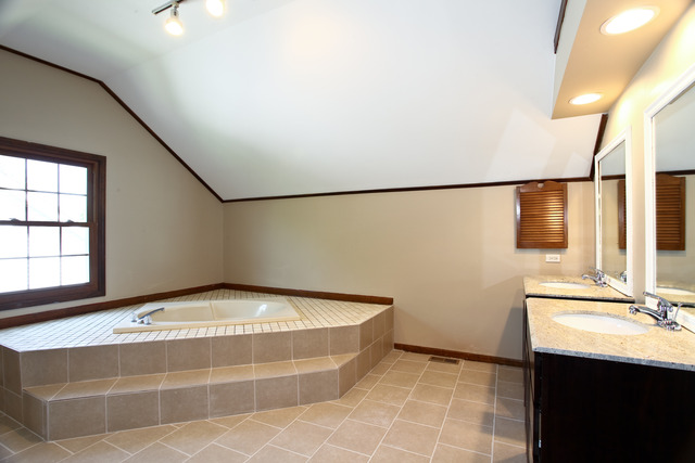 1932 Slippery Rock Road Naperville, IL 60565 - Photo 7 of 14 a view of bathroom with bathtub and shower