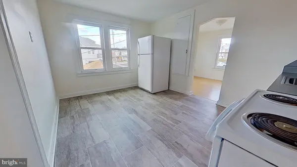 a view of a livingroom with wooden floor