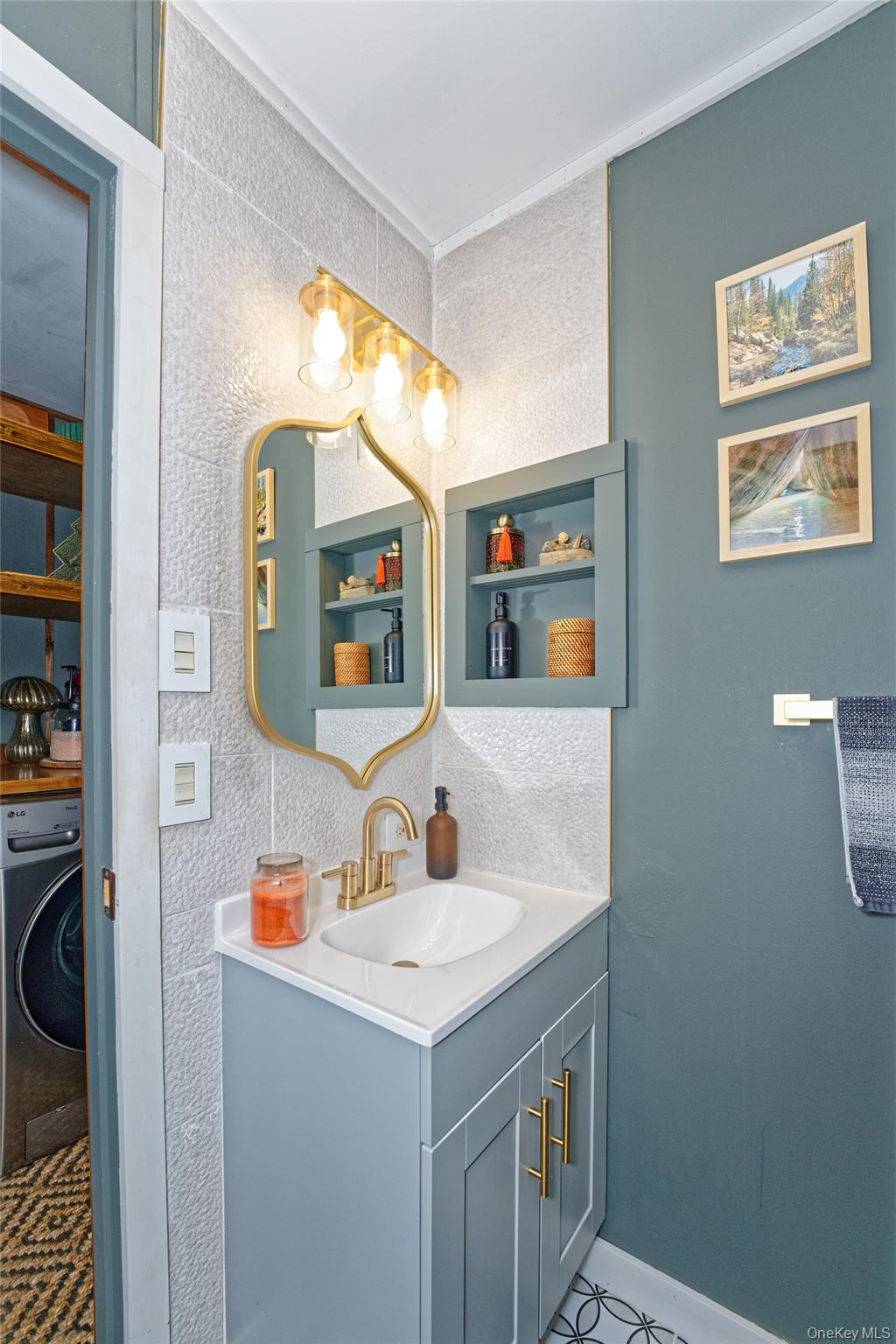 28 Matthew Drive Castleton-on-Hudson, NY 12033 - Photo 14 of 26 Bathroom with vanity and washer / dryer