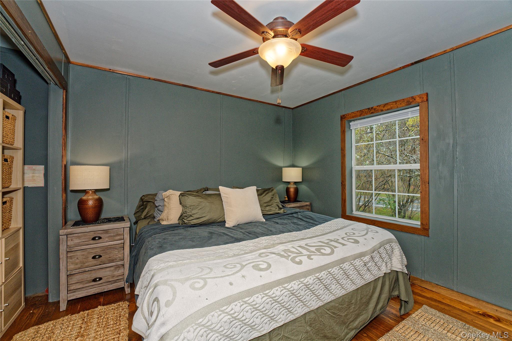 28 Matthew Drive Castleton-on-Hudson, NY 12033 - Photo 8 of 26 Bedroom with wood finished floors, crown molding, a decorative wall, and ceiling fan