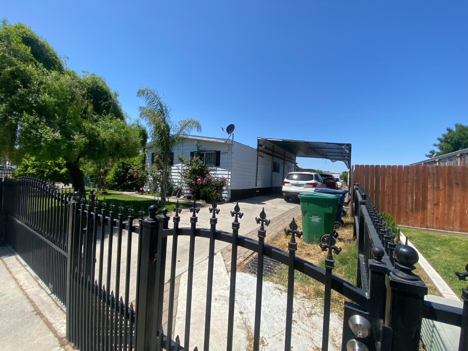 6289 Monica Way Winton, CA 95388 - Photo 18 of 27 a view of a house with backyard and deck
