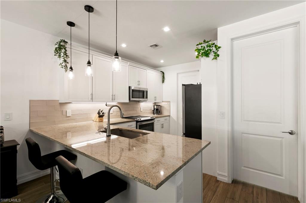 7598 Rockefeller Drive Naples, FL 34119 - Photo 7 of 27