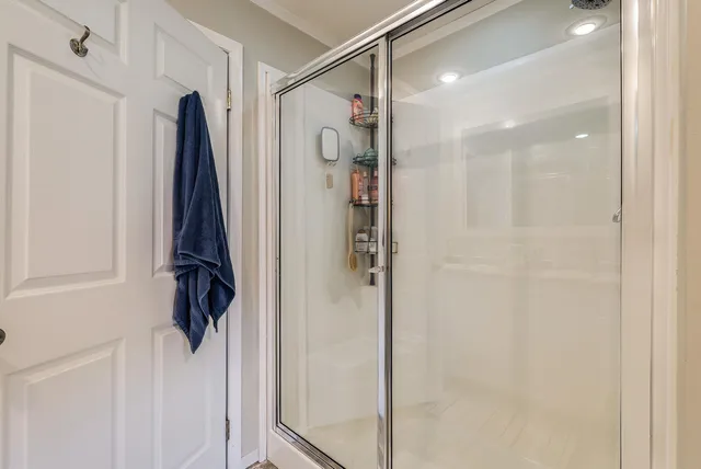 a view of house with deck and outdoor seating