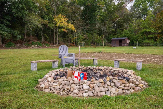 a view of a large body of water with a building in the background