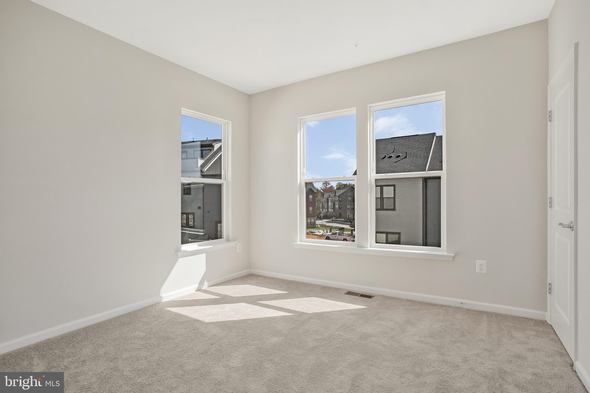 244 Mainstream Drive Laurel, MD 20724 - Photo 17 of 36 an empty room with windows