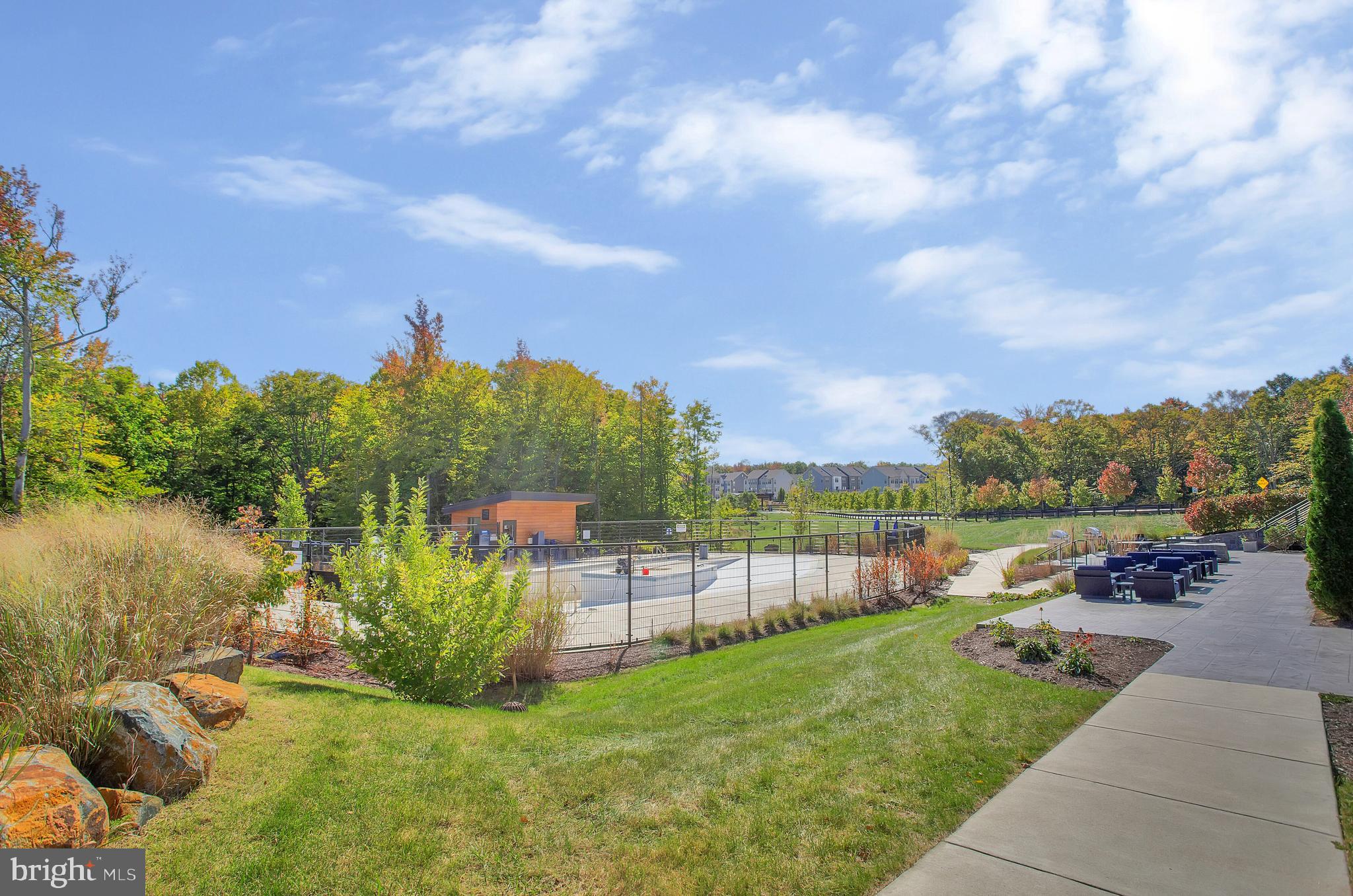 244 Mainstream Drive Laurel, MD 20724 - Photo 34 of 36 a view of a garden with houses