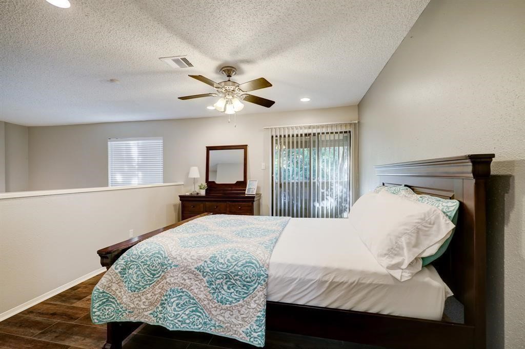 3616 Ocee Street Houston, TX 77063 - Photo 8 of 12 a bedroom with a bed and window