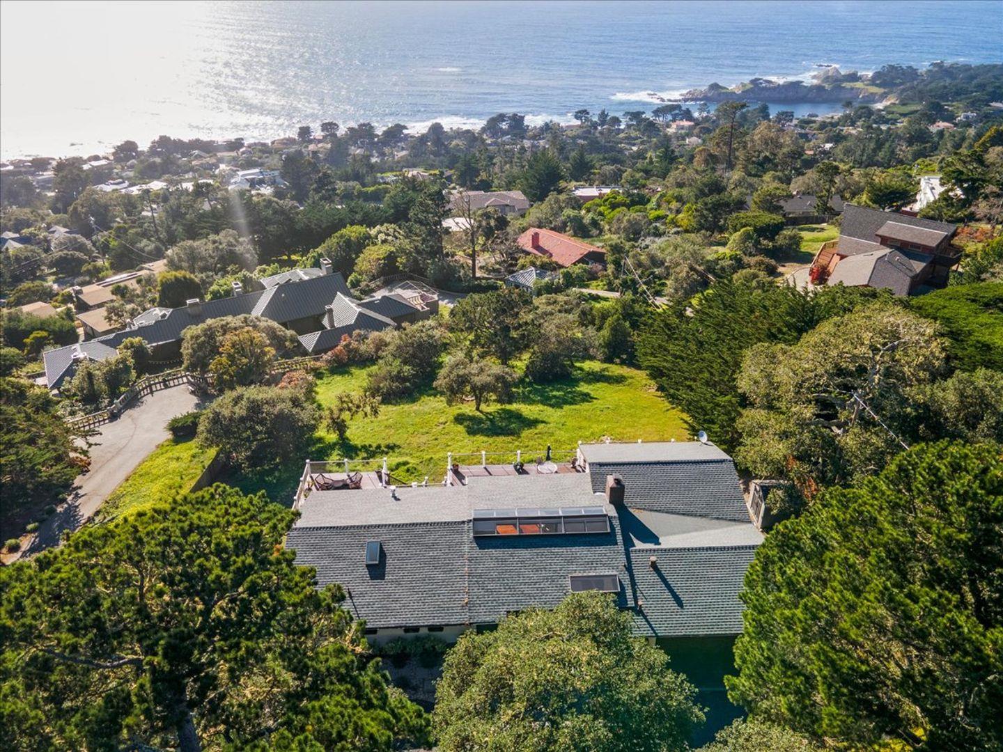 15 Mentone Road Carmel, CA 93923 - Photo 41 of 47 an aerial view of a house with a swimming pool yard and outdoor seating