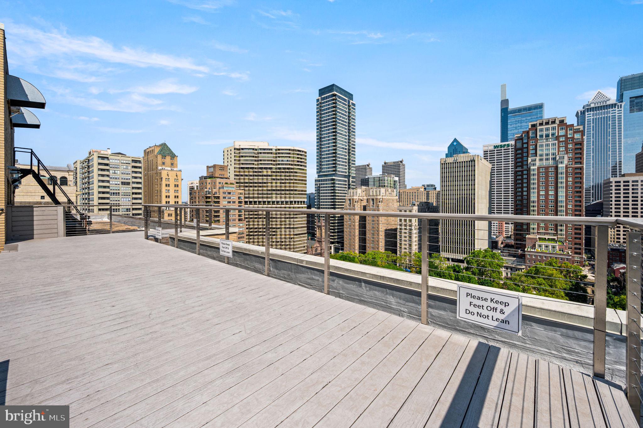 1806-18 Rittenhouse Square, Unit 190607 Philadelphia, PA 19103 - Photo 23 of 34 a view of roof deck with tall buildings