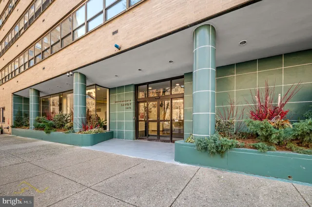 a view of a building with a garden