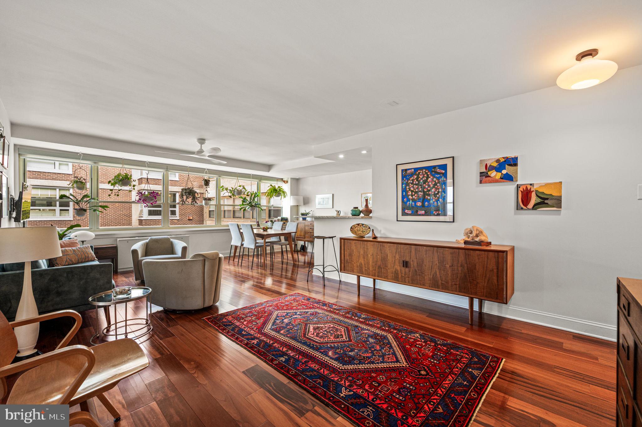 1806-18 Rittenhouse Square, Unit 190607 Philadelphia, PA 19103 - Photo 4 of 34 a living room with furniture and a rug