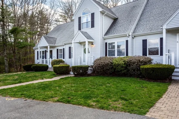 a view of a house with a garden