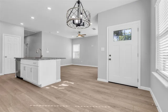 a view of a kitchen with electric appliances