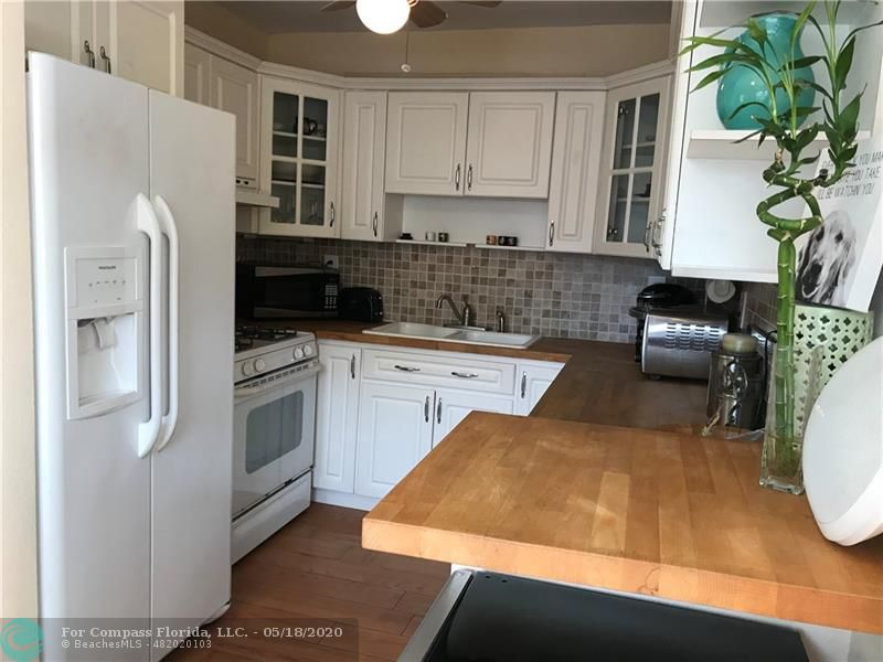 Upgraded Kitchen Cabinets, Natural Gas Range, Butcher Block Counters