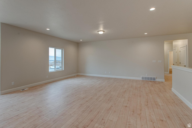1512 West 600 North, Unit O4A Mapleton, UT 84664 - Photo 7 of 24 Unfurnished room with light wood-type flooring and recessed lighting