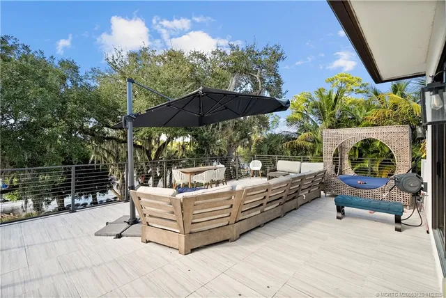 a view of a park with large trees