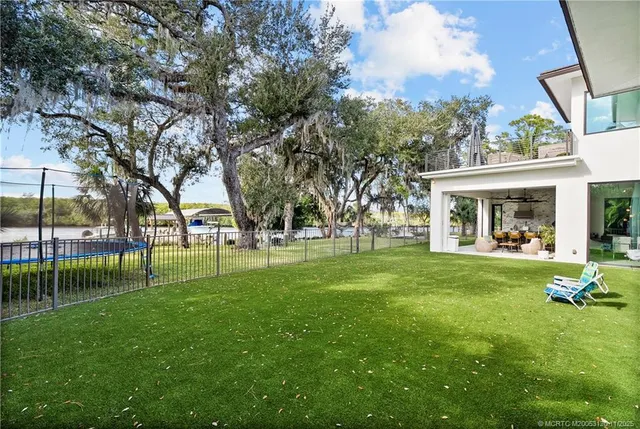 a view of a back yard of the house