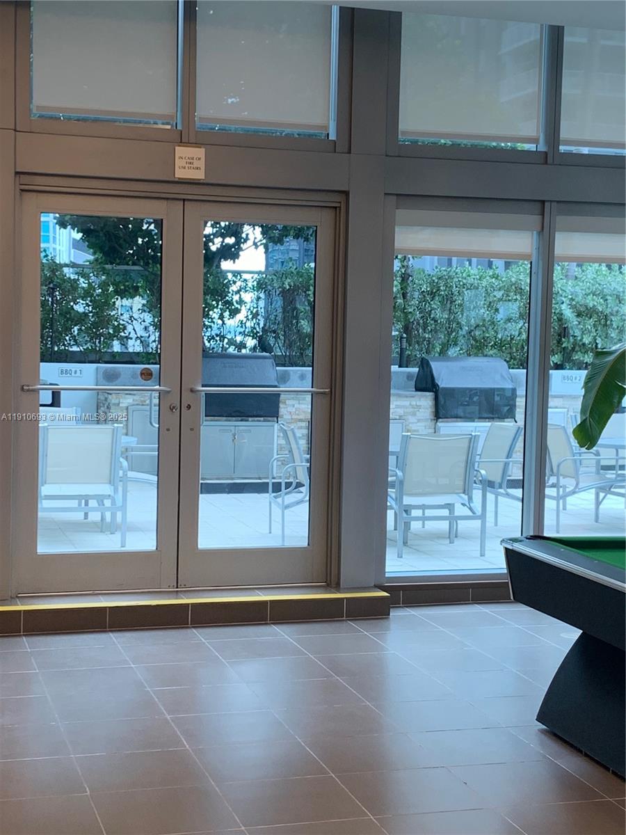 79 Southwest 12th Street, Unit 1002S Miami, FL 33130 - Photo 18 of 22 a view of an empty room with a window