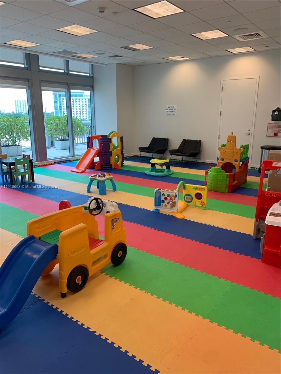 79 Southwest 12th Street, Unit 1002S Miami, FL 33130 - Photo 22 of 22 a room with pool table and windows