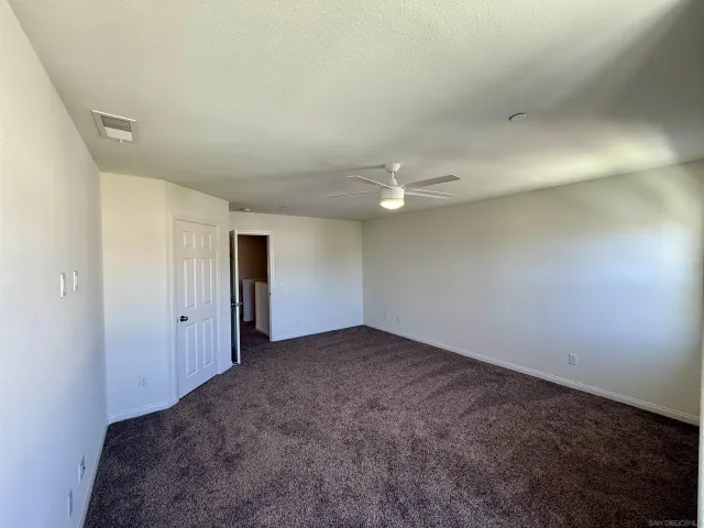 an empty room with a natural light