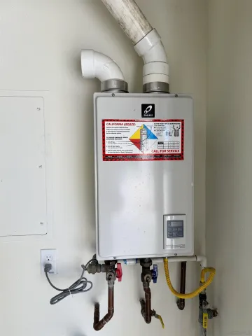 a view of a front of a house with a road